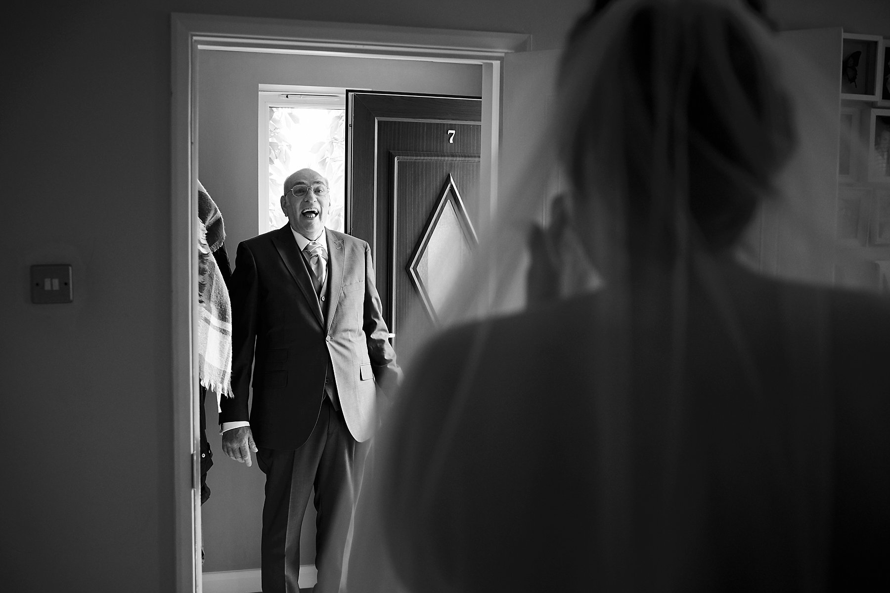 father of bride seeing her in dress for first time
